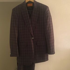 This is a 3 piece men suit with jacket, pants and suit.